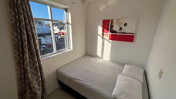 APARTAMENTO CHARMOSO 100 M PRAIA GRANDE