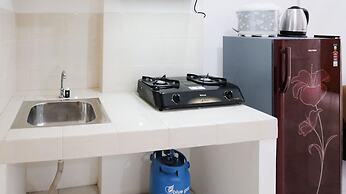 Homey 2Br At Puncak Permai Apartment