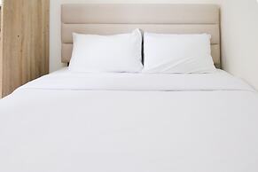 Homey 2Br At Puncak Permai Apartment