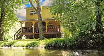 Yellow Cabin on the River