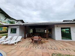 Casa em condomínio com Sauna e Piscina