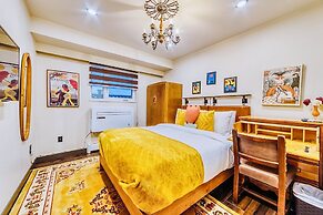 Neocolonial Nouveau Kensington Vacation Home