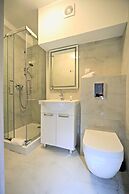 Sara Świętojańska Apartments by Renters