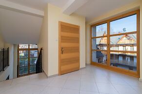 Zakopane Ski Apartment near Polana Szymoszkowa by Renters
