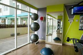 Minimalist And Cozy Studio Room At The Nest Puri Apartment