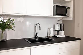 2ndhomes Modern 1BR Home w Sauna&Balcony