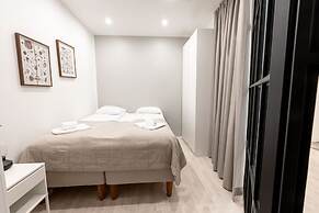 2ndhomes Modern 1BR Home w Sauna&Balcony