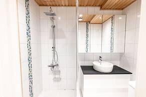 2ndhomes Modern 1BR Home w Sauna&Balcony