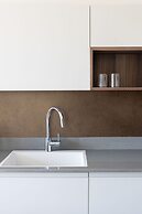 Chic Urban Getaway with Balcony & Mamad by Sea N Rent