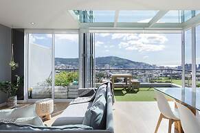 Modern, Chic Penthouse With Mountain, City Sea Views