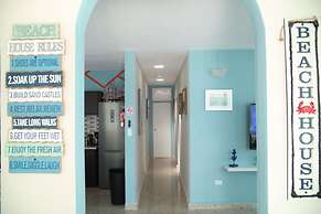 Tropical Breeze Escapes Couples Studio