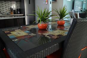 Tropical Breeze Escapes Couples Studio