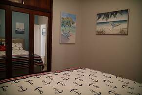 Tropical Breeze Escapes Couples Studio