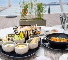 Mina Hotel and Residences By the Torch