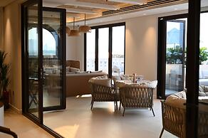 Mina Hotel and Residences By the Torch