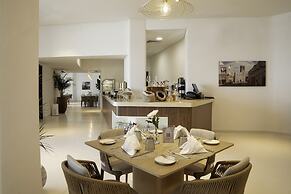 Mina Hotel and Residences By the Torch