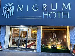 NIGRUM OTEL