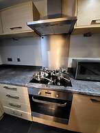 Lovely 4 Bedroom Home With Private Parking