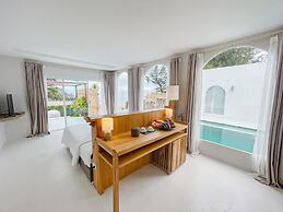 Cape by Sichon Tesoro