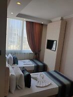 Grand Boss Suit Hotel