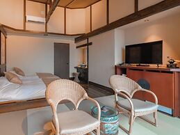 Isoarukinoyuyado Ushiogumo