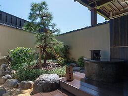 Isoarukinoyuyado Ushiogumo