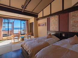 Isoarukinoyuyado Ushiogumo