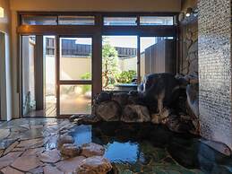 Isoarukinoyuyado Ushiogumo