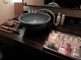 Isoarukinoyuyado Ushiogumo