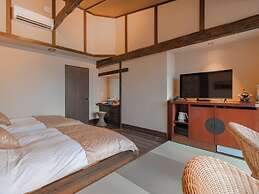 Isoarukinoyuyado Ushiogumo