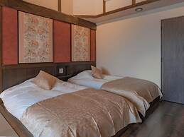 Isoarukinoyuyado Ushiogumo