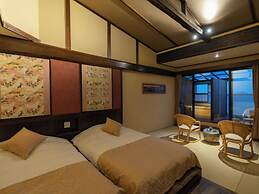 Isoarukinoyuyado Ushiogumo