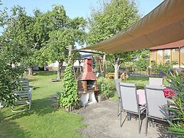 Apartment With Terrace and Pool in the Garden