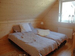 Wooden House With Sauna in Kustelberg
