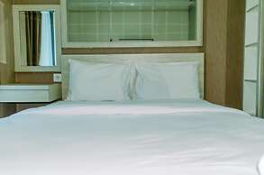 Homey And Warm Studio Room At Tifolia Apartment