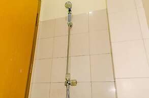 Homey And Warm Studio Room At Tifolia Apartment