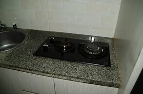 Homey And Warm Studio Room At Tifolia Apartment