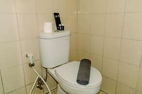 Homey And Warm Studio Room At Tifolia Apartment