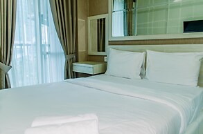 Homey And Warm Studio Room At Tifolia Apartment