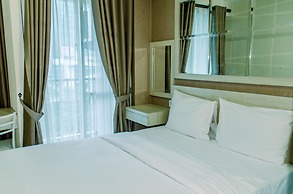 Homey And Warm Studio Room At Tifolia Apartment