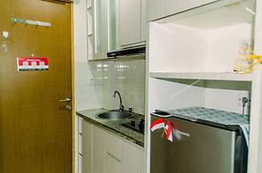 Homey And Warm Studio Room At Tifolia Apartment