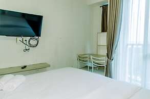 Homey And Warm Studio Room At Tifolia Apartment