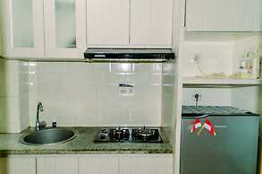 Homey And Warm Studio Room At Tifolia Apartment