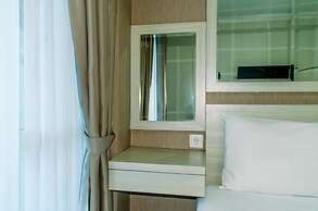 Homey And Warm Studio Room At Tifolia Apartment