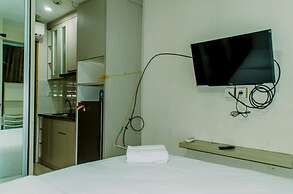 Homey And Warm Studio Room At Tifolia Apartment