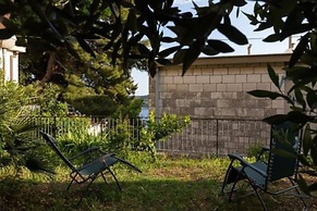 Apartment Hitri - One Bedroom Apartment With Terrace and Garden View