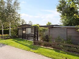 Light and Quiet Chalet With Beautiful Terrace Near Historic Goedereede