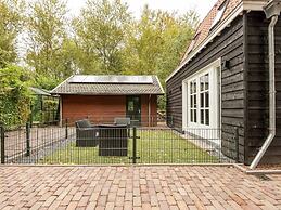 Charming Holiday Home in Poortugaal With Garden