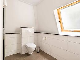 Charming Holiday Home in Poortugaal With Garden