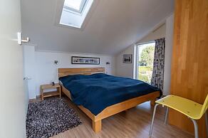 Holiday Home in the Middle of the Green North Sea Park Near the Beach 